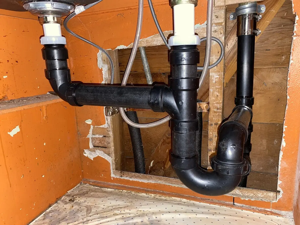 Professional Garbage Disposal Repair equipment and tools on the job in Plain City